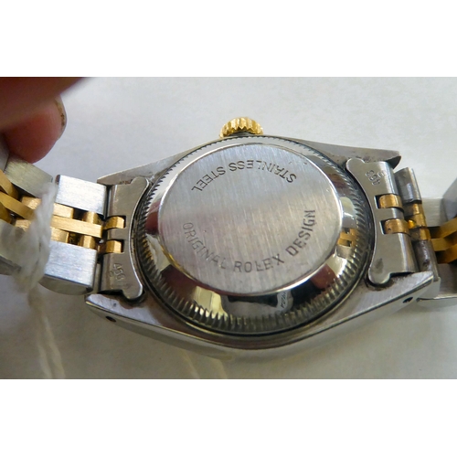 226 - A lady's Rolex Oyster Perpetual Date, bi-coloured stainless steel cased bracelet wristwatch, faced b... 