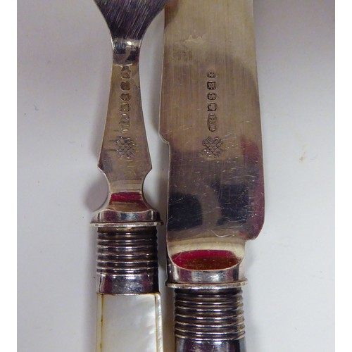 230 - Silver plated collectables: to include an early 20thC set of twelve dessert knives and forks, on mot... 