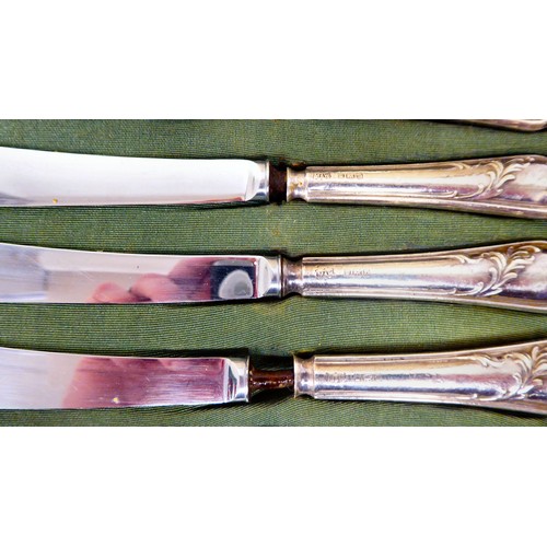 230 - Silver plated collectables: to include an early 20thC set of twelve dessert knives and forks, on mot... 