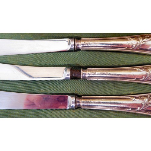 230 - Silver plated collectables: to include an early 20thC set of twelve dessert knives and forks, on mot... 