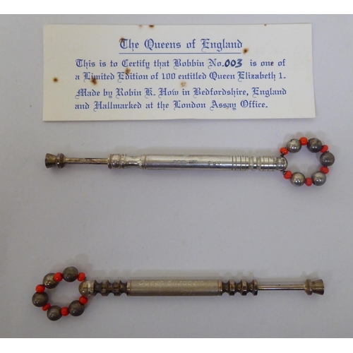 422 - Two silver cased presentation lace bobbins from The Queens of England Series by Robin Haw, London ma... 