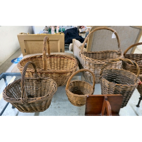 51 - Handheld wicker items: to include baskets; and a modern mahogany wall bracket  14