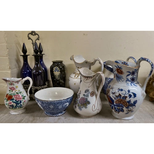 53 - Victorian and later china and glass: to include a selection of wash jugs; and clear and cranberry co... 