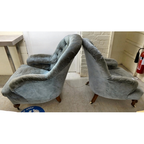 54 - Two similar Victorian and later blue/grey fabric upholstered nursing chairs, raised on turned legs a... 