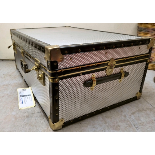 58 - A stud upholstered metal bound trunk with straight sides and a hinged lid  11