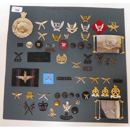 168 - British military badges and other insignia, some copies: to include 11th Gurkha Rifles(Please Note: ... 