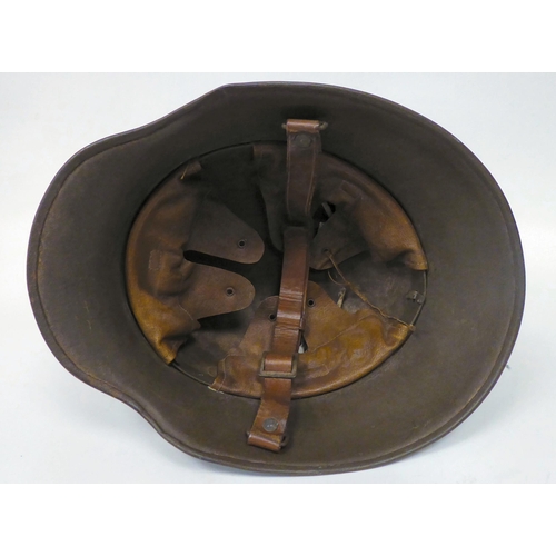 170 - A German World War II steel helmet with decal, hide liner and chinstrap (Please Note: this lot ... 