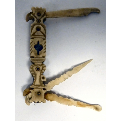 171 - A prisoner of war bone carved, folding, handheld 'multitool'