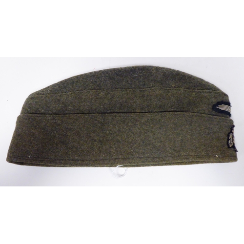 178 - A German SS khaki side cap(Please Note: this lot is subject to the statement made in the Auctioneers... 