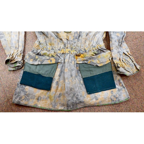 187 - A German SS camouflage smock(Please Note: this lot is subject to the statement made in the Auctionee... 