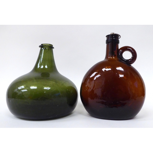 20 - Glassware: to include an early 18thC green glass wine bottle of squat, bulbous form  6.5