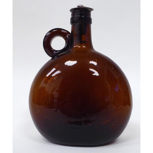 20 - Glassware: to include an early 18thC green glass wine bottle of squat, bulbous form  6.5