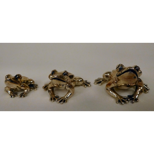 21 - A graduated set of three miniature silver frogs  mixed marks  largest 1.25