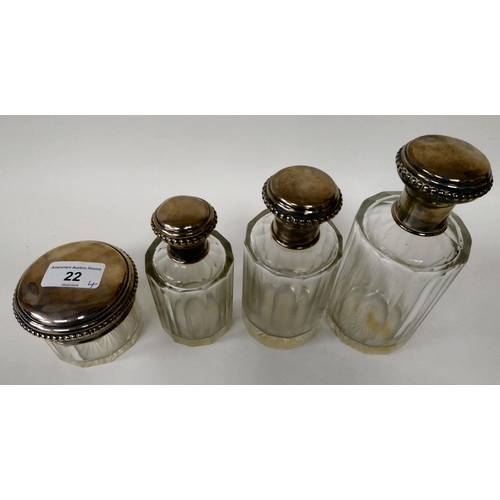 22 - A set of four 19thC silver coloured metal mounted, facet cut glass dressing table jars with bead bor... 