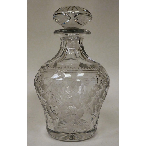 30 - Glassware: to include an early 20thC decanter and stopper with wheel engraved rose bush ornament&nbs... 