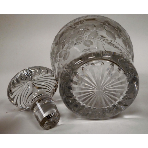 30 - Glassware: to include an early 20thC decanter and stopper with wheel engraved rose bush ornament&nbs... 