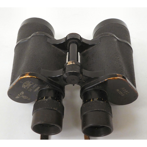 31 - A pair of World War II Karl Zeiss, reticulated Kaiser Marine binoculars DF 7x50  bearing stamps, a T... 