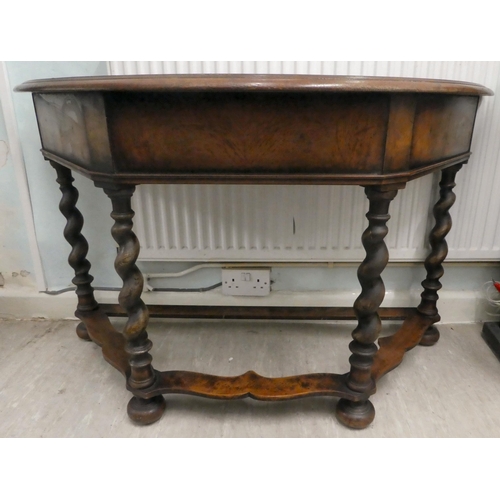 331 - An early 20thC marquetry inlaid oak and walnut demi-lune console table, raised on barleytwist legs  ... 