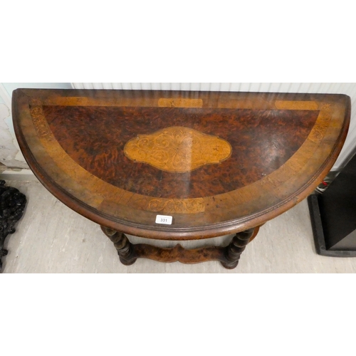 331 - An early 20thC marquetry inlaid oak and walnut demi-lune console table, raised on barleytwist legs  ... 