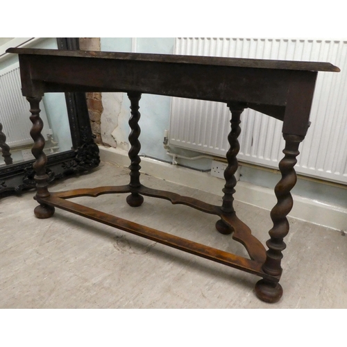 331 - An early 20thC marquetry inlaid oak and walnut demi-lune console table, raised on barleytwist legs  ... 