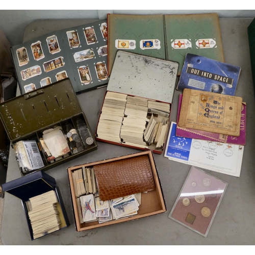 336 - Uncollated postage stamps, cigarette cards and coins: to include British examples 