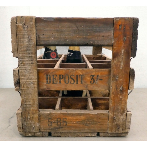 337 - A vintage stained pine crate  inscribed 'Gents Sparkling Ades, Bedford'; and two bottles of Moet Cha... 