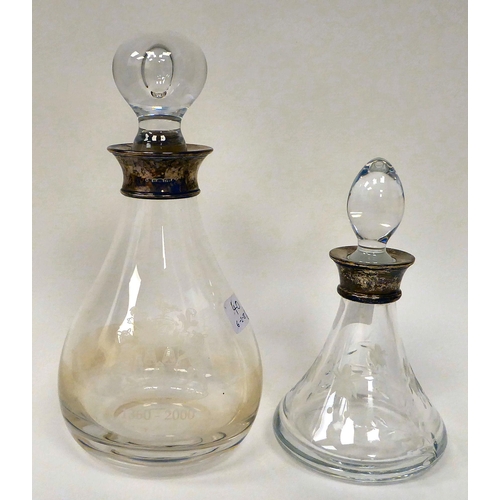 40 - Glassware: to include a ship's decanter and stopper with a triple ring neck and an applied silver co... 