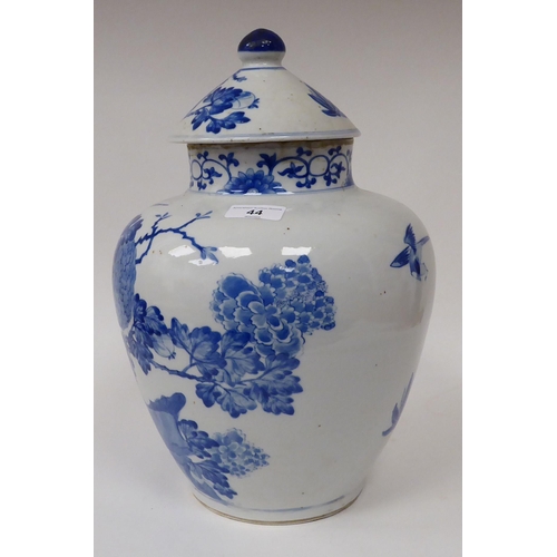 44 - A 20thC Chinese porcelain, baluster shape vase and cover, decorated in blue and white with exotic bi... 