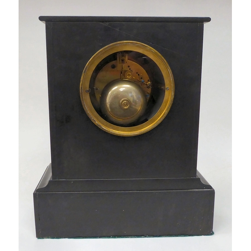 51 - A late 19thC black slate and mottled green marble cased mantel clock with straight sides, on a deep ... 