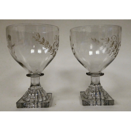 6 - A pair of late 18thC glass rummers, each with a monogrammed bowl, on a square foot  5.5