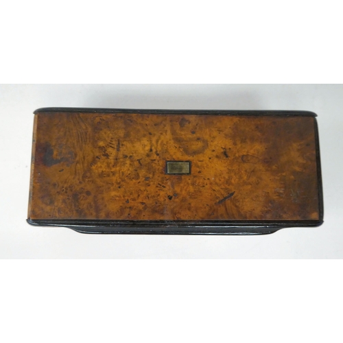 60 - A 19thC figured walnut and tortoiseshell lined snuff box with a flush fitting hinged lid