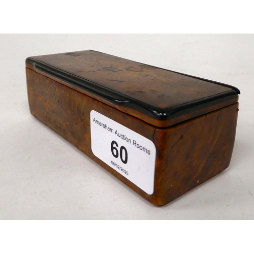 60 - A 19thC figured walnut and tortoiseshell lined snuff box with a flush fitting hinged lid