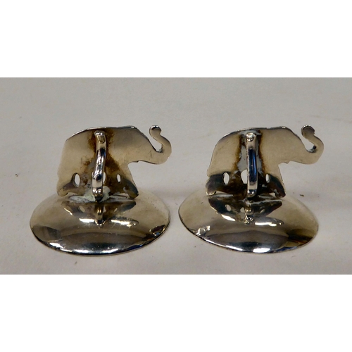 63 - A set of four silver owl menu holders  Sampson Mordan  Chester 1907; and a pair of later, ... 