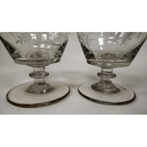 7 - A pair of early 19thC glass rummers, each with a monogrammed bowl, on a circular foot  5