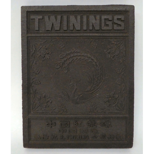 70 - A Twinings black tea block, depicting the company's logo and an exotic bird and floral arrangement w... 