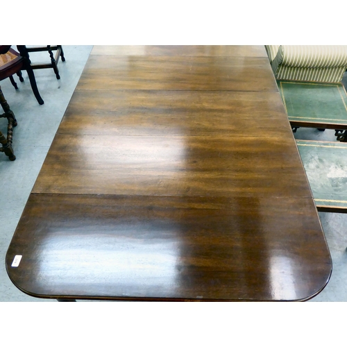 38 - A modern reproduction of a 19thC mahogany Pembroke style dining table with D-ends and four leaves, r... 