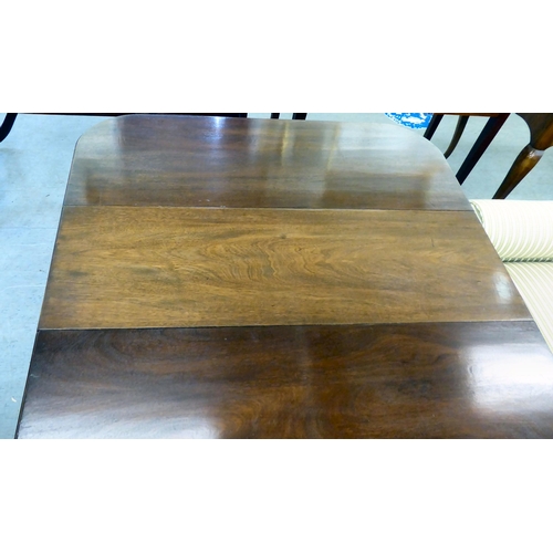 38 - A modern reproduction of a 19thC mahogany Pembroke style dining table with D-ends and four leaves, r... 