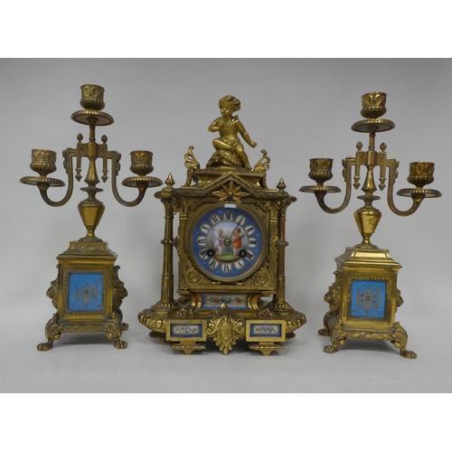 1 - A circa 1880 French gilt brass cased, three piece clock garniture, set with overpainted porcelain pl... 