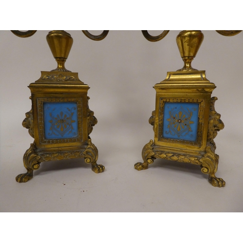 1 - A circa 1880 French gilt brass cased, three piece clock garniture, set with overpainted porcelain pl... 