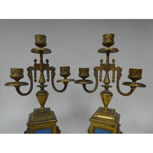 1 - A circa 1880 French gilt brass cased, three piece clock garniture, set with overpainted porcelain pl... 