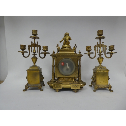 1 - A circa 1880 French gilt brass cased, three piece clock garniture, set with overpainted porcelain pl... 