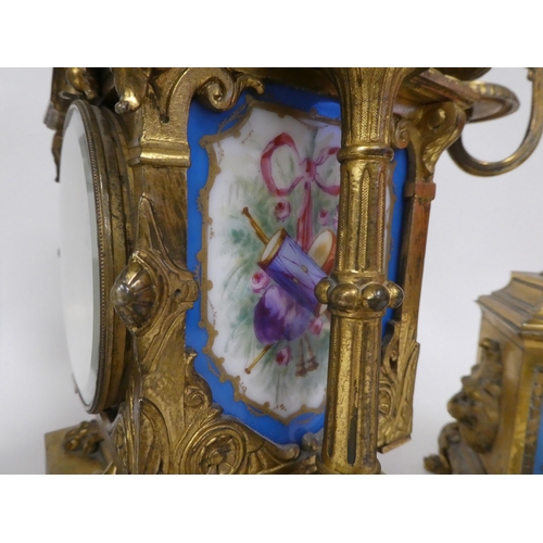 1 - A circa 1880 French gilt brass cased, three piece clock garniture, set with overpainted porcelain pl... 