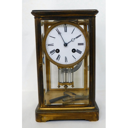 117 - A late 19thC French four glass brass cased mantel clock; the mercurial pendulum driven movement face... 