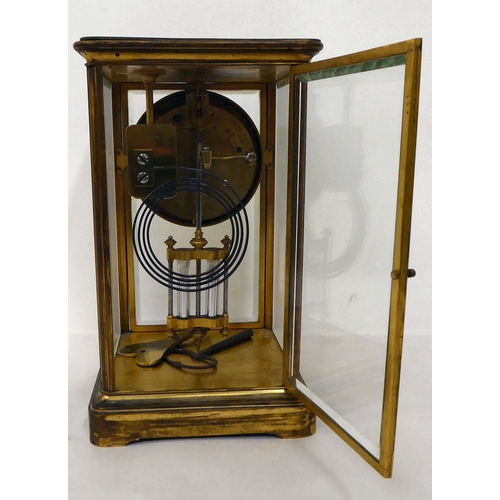 117 - A late 19thC French four glass brass cased mantel clock; the mercurial pendulum driven movement face... 