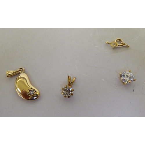 18 - White and yellow metal cubic zirconia and other set dress jewellery: to include rings  stamped ... 