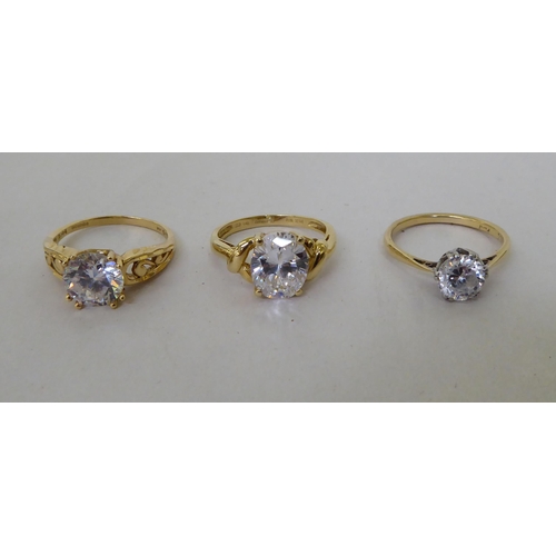 18 - White and yellow metal cubic zirconia and other set dress jewellery: to include rings  stamped ... 