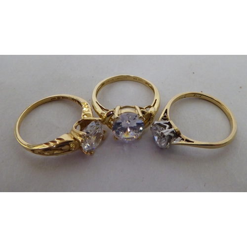 18 - White and yellow metal cubic zirconia and other set dress jewellery: to include rings  stamped ... 