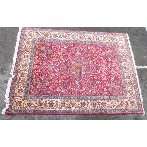 277 - A Persian Najafabad design carpet, decorated with trailing vines and floral patterns  126