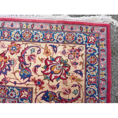 277 - A Persian Najafabad design carpet, decorated with trailing vines and floral patterns  126