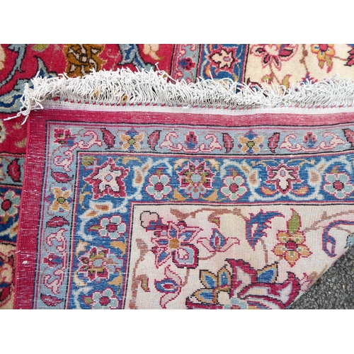 277 - A Persian Najafabad design carpet, decorated with trailing vines and floral patterns  126